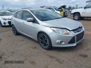 2014 Ford Focus SE with VIN 1FADP3K2XEL248233, listed as a IAAI auction lot 41932711 with 101,504 mi miles. Bid and sale history available at carsss.com. Image 1.