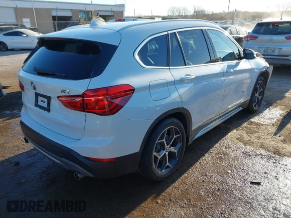 2016 BMW X1 xDrive28i with VIN WBXHT3C37GP888249, listed as a IAAI auction lot 41794102 with 116,175 mi miles and . Bid and sale history available at DreamBid. Image 4.