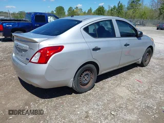 2014 Nissan Versa SV with VIN 3N1CN7AP5EL804830, listed as a IAAI auction lot 41886107 with 140,952 mi miles. Bid and sale history available at carsss.com. Image 4.