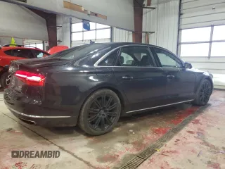 2015 Audi A8 L 4.0T with VIN WAU32AFD3FN036507, listed as a Copart auction lot 82298094 with 77,156 mi miles and Salvage Title. Bid and sale history available at carsss.com. Image 3.
