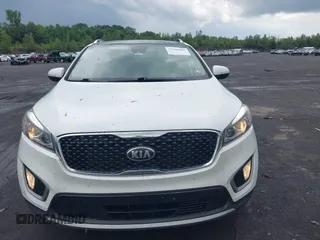 2017 Kia Sorento EX with VIN 5XYPHDA55HG336810, listed as a IAAI auction lot 39946463 with 129,876 mi miles and . Bid and sale history available at carsss.com. Image 12.