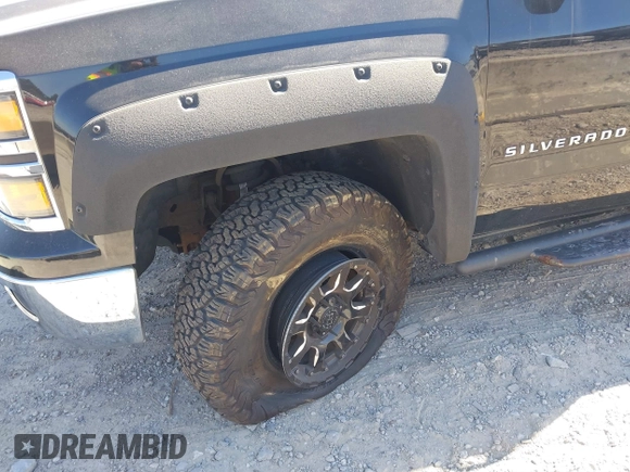 2014 Chevrolet Silverado 1500 LT with VIN 1GCVKREH3EZ320659, listed as a IAAI auction lot 41665352 with 105,574 mi miles and . Bid and sale history available at DreamBid. Image 6.