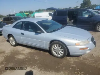 1997 Chrysler Sebring LXi z VIN 4C3AU52NXVE180034, wystawiony jako Copart lot #73413994 z przebiegiem 123 637 mil mil oraz Tytuł czysty. Historia ofert i sprzedaży dostępna na DreamBid. Obrazek 4.