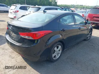 2013 Hyundai Elantra GLS z VIN KMHDH4AE5DU815767, wystawiony jako IAAI lot #42249832 z przebiegiem 188 000 mil mil oraz . Historia ofert i sprzedaży dostępna na DreamBid. Obrazek 4.