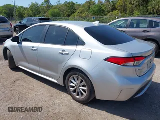 2021 Toyota Corolla LE with VIN JTDVPMAE4MJ173183, listed as a IAAI auction lot 42016420 with 114,296 mi miles. Bid and sale history available at carsss.com. Image 3.