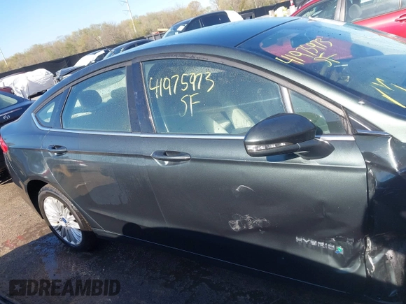 2015 Ford Fusion SE Hybrid with VIN 3FA6P0LU2FR135144, listed as a IAAI auction lot 41975973 with 89,315 mi miles. Bid and sale history available at carsss.com. Image 13.