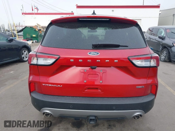 2021 Ford Escape Titanium Hybrid with VIN 1FMCU9DZ1MUA01599, listed as a IAAI auction lot 41912441 with 20,660 mi miles and . Bid and sale history available at DreamBid. Image 15.