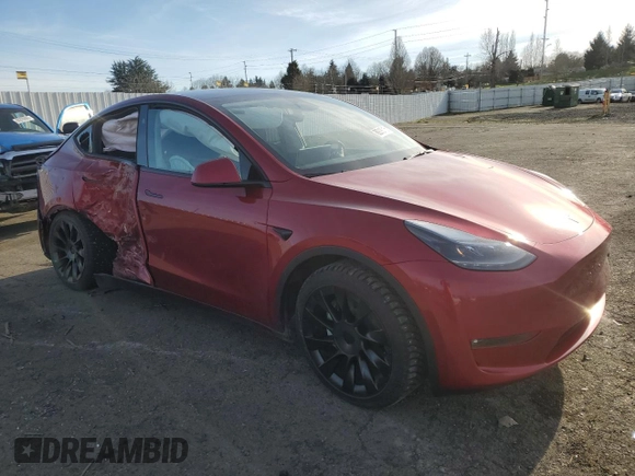 2024 Tesla Model Y Long Range with VIN 7SAYGAEEXRF056411, listed as a Copart auction lot 89218715 with Not Provided miles and Salvage Title. Bid and sale history available at DreamBid. Image 4.
