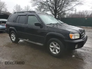 2004 Nissan Pathfinder SE with VIN JN8DR09Y44W911455, listed as a Copart auction lot 48134835 with 198,794 mi miles and Salvage title. Bid and sale history available at DreamBid. Image 4.