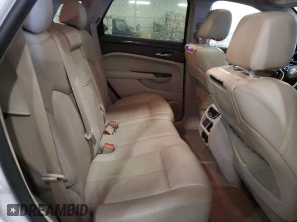 2014 Cadillac SRX Premium Collection z VIN 3GYFNGE36ES581361, wystawiony jako Copart lot #88540815 z przebiegiem 137 047 mil mil oraz Nie do naprawy. Historia ofert i sprzedaży dostępna na DreamBid. Obrazek 11.