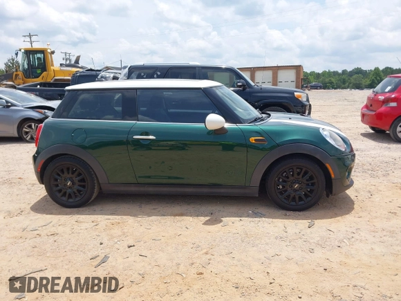 2014 MINI Hardtop with VIN WMWXM5C53ET972847, listed as a IAAI auction lot 42502121 with 165,475 mi miles and . Bid and sale history available at DreamBid. Image 13.