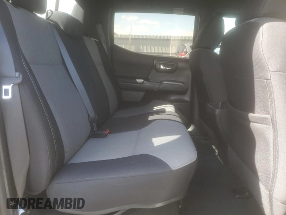 2023 Toyota Tacoma SR z VIN 3TMCZ5AN6PM539899, wystawiony jako Copart lot #52238445 z przebiegiem 30 070 mil mil oraz Szkoda całkowita • Salvage title. Historia ofert i sprzedaży dostępna na DreamBid. Obrazek 10.