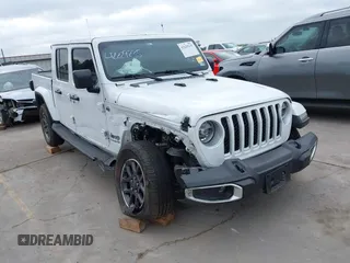2021 Jeep Gladiator High Altitude with VIN 1C6HJTFG8ML551570, listed as a IAAI auction lot 42229235 with 56,959 mi miles and . Bid and sale history available at DreamBid. Image 1.