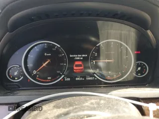 2014 BMW 7 Series 740Li with VIN WBAYE4C52ED138770, listed as a Copart auction lot 53647665 with 106,827 mi miles and Salvage title. Bid and sale history available at DreamBid. Image 9.