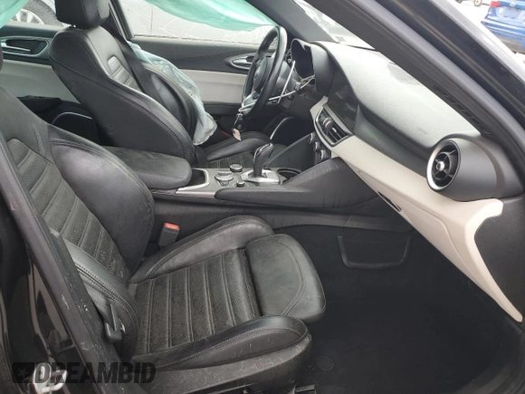 2020 Alfa Romeo Giulia Ti Sport z VIN ZARFANBN8L7638821, wystawiony jako Copart lot #49105635 z przebiegiem 41 052 mil mil oraz Szkody całkowita. Historia ofert i sprzedaży dostępna na DreamBid. Obrazek 7.