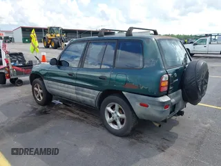 1999 Toyota RAV4 with VIN JT3GP10V4X7052720, listed as a IAAI auction lot 42490948 with 321,165 mi miles and . Bid and sale history available at DreamBid. Image 3.