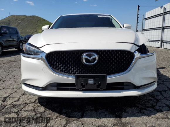 2021 Mazda 6 Touring with VIN JM1GL1VM0M1612027, listed as a Copart auction lot 48262185 with 67,568 mi miles and Salvage Title. Bid and sale history available at DreamBid. Image 5.