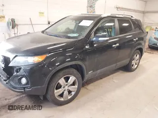 2013 Kia Sorento EX with VIN 5XYKUDA63DG410184, listed as a IAAI auction lot 41416399 with 214,623 mi miles. Bid and sale history available at carsss.com. Image 2.