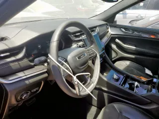 2023 Jeep Grand Cherokee Altitude with VIN 1C4RJKAGXP8736144, listed as a Copart auction lot 59230585 with 44,849 mi miles and Salvage title. Bid and sale history available at DreamBid. Image 7.