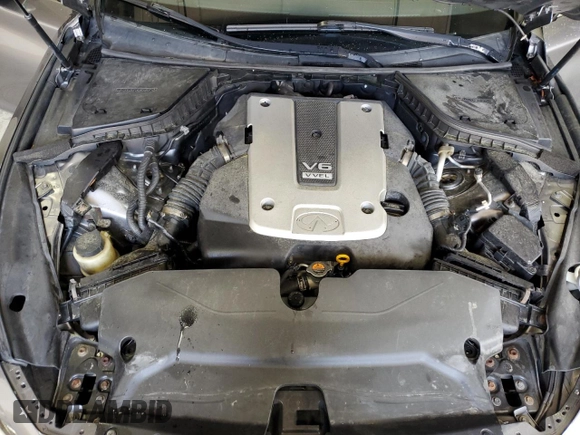 2015 Infiniti Q50 Premium with VIN JN1BV7ARXFM423026, listed as a Copart auction lot 58139225 with 130,544 mi miles and Salvage title. Bid and sale history available at DreamBid. Image 11.