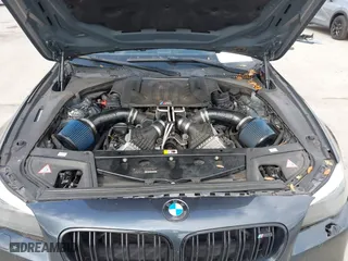 2013 BMW M5 with VIN WBSFV9C59DD096774, listed as a IAAI auction lot 41608286 with 82,601 mi miles. Bid and sale history available at carsss.com. Image 10.