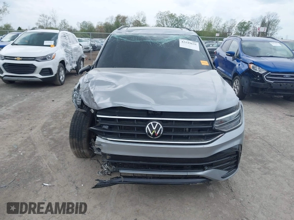 2022 Volkswagen Tiguan SE R-Line Black с VIN 3VVCB7AX1NM065960, выставлен на аукционе IAAI как лот 42149626 с пробегом 71 698 миль миль и . История ставок и продаж доступна на DreamBid. Изображение 12.