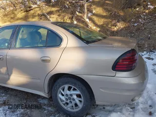 2004 Pontiac Grand Am SE with VIN 1G2NE52F24C231559, listed as a IAAI auction lot 41606544 with 65,524 mi miles. Bid and sale history available at carsss.com. Image 14.
