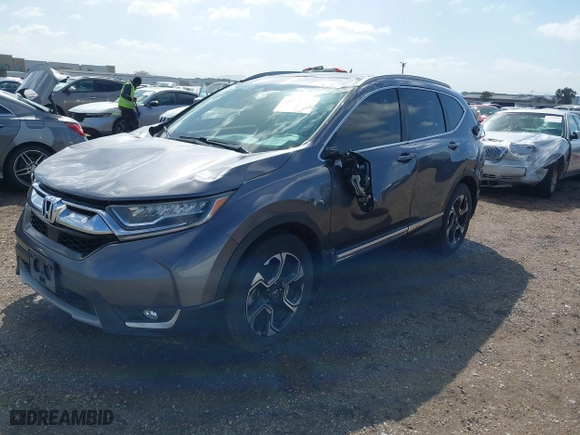 2019 Honda CR-V Touring with VIN 7FARW1H99KE005270, listed as a IAAI auction lot 41762812 with 122,583 mi miles. Bid and sale history available at carsss.com. Image 2.