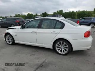 2011 BMW 3 Series 328i xDrive with VIN WBAPK7G5XBNN86258, listed as a Copart auction lot 61224485 with 202,186 mi miles and Salvage title. Bid and sale history available at DreamBid. Image 2.