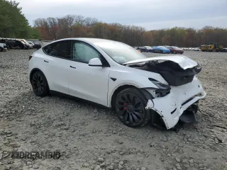 2022 Tesla Model Y Performance with VIN 7SAYGDEF9NF564566, listed as a Copart auction lot 53799715 with 38,963 mi miles and Salvage title. Bid and sale history available at DreamBid. Image 4.