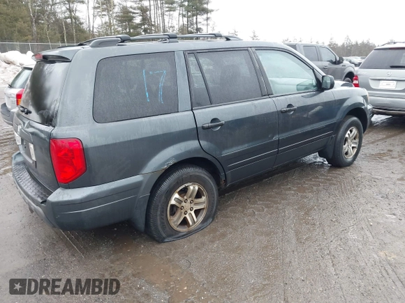 2003 Honda Pilot EX with VIN 2HKYF184X3H561179, listed as a IAAI auction lot 41709312 with 302,368 mi miles. Bid and sale history available at carsss.com. Image 4.