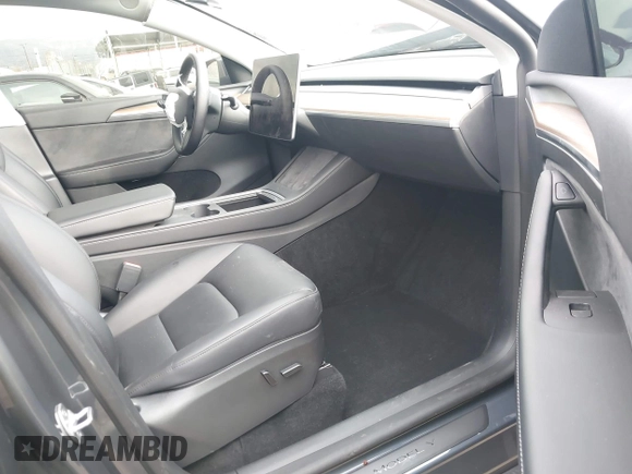 2023 Tesla Model Y Long Range with VIN 7SAYGDEE4PA028440, listed as a IAAI auction lot 41488136 with 29,229 mi miles and . Bid and sale history available at DreamBid. Image 5.
