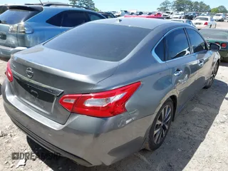 2016 Nissan Altima SR with VIN 1N4AL3AP0GC132991, listed as a IAAI auction lot 42058890 with 185,597 mi miles and . Bid and sale history available at carsss.com. Image 4.