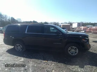2019 Chevrolet Suburban LT with VIN 1GNSCHKCXKR405939, listed as a IAAI auction lot 41591475 with 106,554 mi miles and . Bid and sale history available at DreamBid. Image 12.