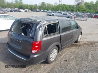 2017 Dodge Grand Caravan SE Plus z VIN 2C4RDGBGXHR549334, wystawiony jako IAAI lot #42097288 z przebiegiem 60 896 mil mil oraz . Historia ofert i sprzedaży dostępna na DreamBid. Obrazek 18.