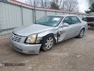 2006 Cadillac DTS 1SC z VIN 1G6KD57Y56U126557, wystawiony jako IAAI lot #41565515 z przebiegiem 251 316 mil mil oraz . Historia ofert i sprzedaży dostępna na DreamBid. Obrazek 2.