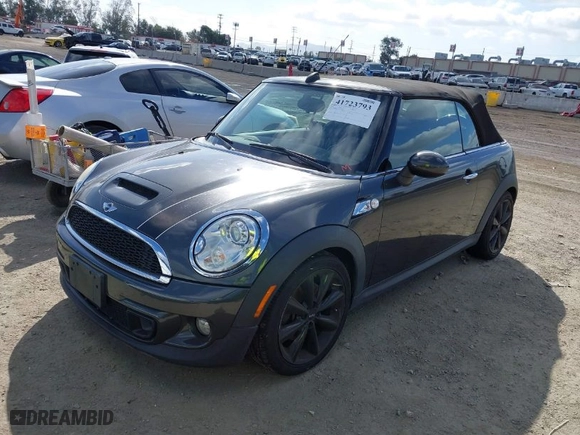2011 MINI Cooper Convertible s with VIN WMWZP3C56BTX82699, listed as a IAAI auction lot 41723793 with 110,135 mi miles. Bid and sale history available at carsss.com. Image 2.