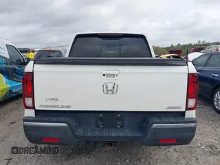 2019 Honda Ridgeline RTL-E with VIN 5FPYK3F78KB018356, listed as a IAAI auction lot 41946363 with 61,472 mi miles and . Bid and sale history available at DreamBid. Image 17.