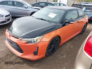 2015 Scion tC with VIN JTKJF5C7XFJ008076, listed as a IAAI auction lot 40856462 with 155,117 mi miles. Bid and sale history available at carsss.com. Image 18.
