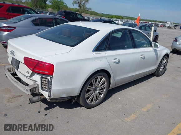 2011 Audi A8 z VIN WAUAVAFD7BN021601, wystawiony jako IAAI lot #42233726 z przebiegiem 182 583 mil mil oraz . Historia ofert i sprzedaży dostępna na DreamBid. Obrazek 4.