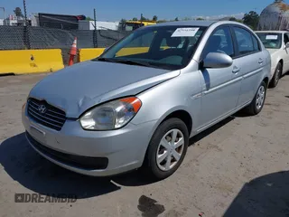 2007 Hyundai Accent GLS with VIN KMHCN46C57U087156, listed as a IAAI auction lot 42151298 with 81,588 mi miles. Bid and sale history available at carsss.com. Image 2.