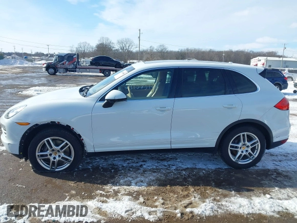2014 Porsche Cayenne with VIN WP1AA2A2XELA95734, listed as a IAAI auction lot 41583908 with 95,751 mi miles and . Bid and sale history available at DreamBid. Image 14.
