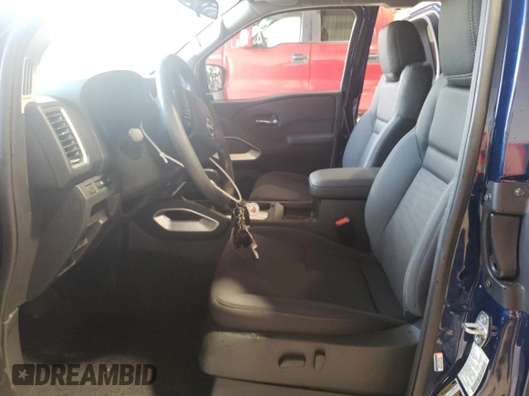2023 Nissan Frontier S with VIN 1N6ED1CL0PN648535, listed as a Copart auction lot 64853845 with 7,872 mi miles and Salvage title. Bid and sale history available at DreamBid. Image 7.