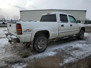 2003 GMC Sierra 1500HD SLE z VIN 1GTGK13UX3F218073, wystawiony jako Copart lot #73334613 z przebiegiem 222 753 mil mil oraz Szkody całkowita. Historia ofert i sprzedaży dostępna na DreamBid. Obrazek 3.