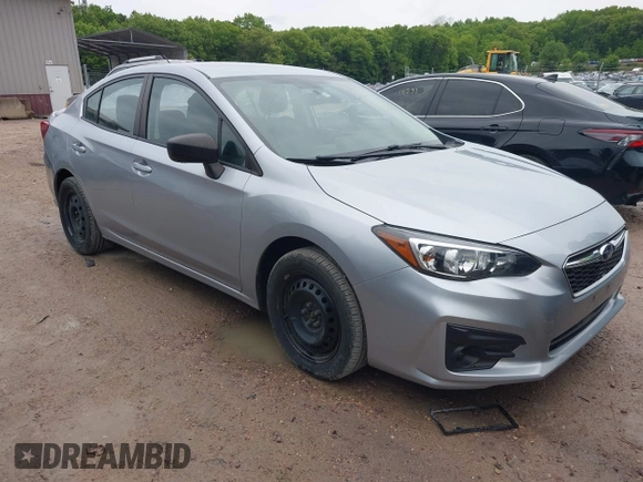 2019 Subaru Impreza with VIN 4S3GKAB60K3608733, listed as a IAAI auction lot 42361729 with 58,863 mi miles and . Bid and sale history available at DreamBid. Image 1.