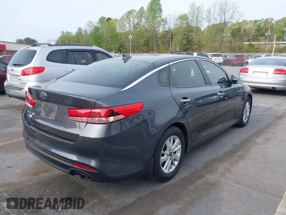 2016 Kia Optima LX with VIN KNAGT4L33G5107444, listed as a IAAI auction lot 41971006 with 174,997 mi miles. Bid and sale history available at carsss.com. Image 4.