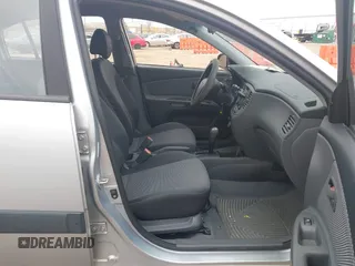2009 Kia Rio LX with VIN KNADE243596544181, listed as a IAAI auction lot 41876733 with 200,216 mi miles. Bid and sale history available at carsss.com. Image 5.