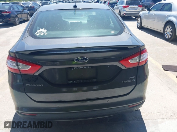 2016 Ford Fusion SE Hybrid with VIN 3FA6P0LU3GR127121, listed as a IAAI auction lot 41840795 with 88,281 mi miles. Bid and sale history available at carsss.com. Image 17.