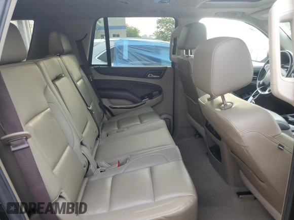2019 Chevrolet Tahoe LT with VIN 1GNSKBKC2KR349527, listed as a Copart auction lot 58496695 with 128,590 mi miles and Salvage title. Bid and sale history available at DreamBid. Image 11.
