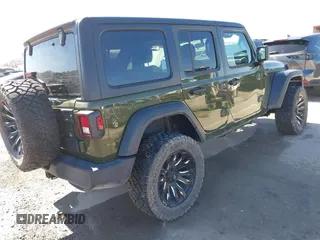 2021 Jeep Wrangler Unlimited Sport S with VIN 1C4HJXDG2MW814413, listed as a IAAI auction lot 41712547 with 11,913 mi miles. Bid and sale history available at carsss.com. Image 4.